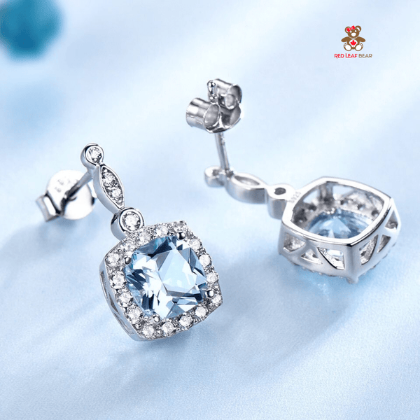 Red Leaf Bear - FREE Shipping - Something for Everyone Earrings Sterling Silver Sky Blue Topaz Gemstone Earrings.