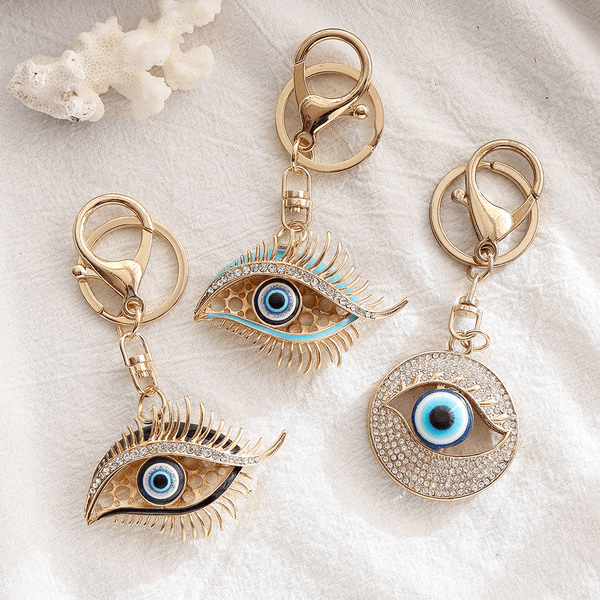 Red Leaf Bear - FREE Shipping - Something for Everyone Evil Eye Gold Plated Rhinestone Bling Bling Evil Eye Keychain Handbag Pendant.