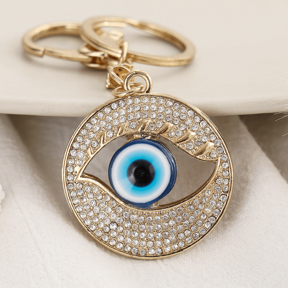 Red Leaf Bear - FREE Shipping - Something for Everyone Evil Eye style 1 Gold Plated Rhinestone Bling Bling Evil Eye Keychain Handbag Pendant.